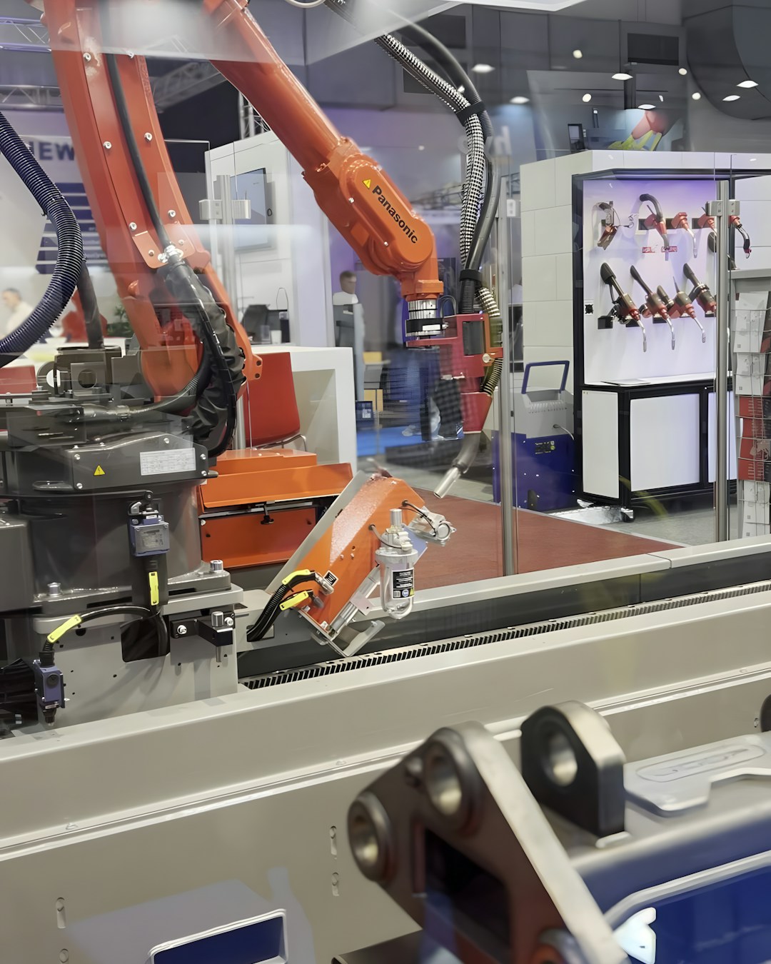 An industrial robot is working inside, industrial robot automation warehouse